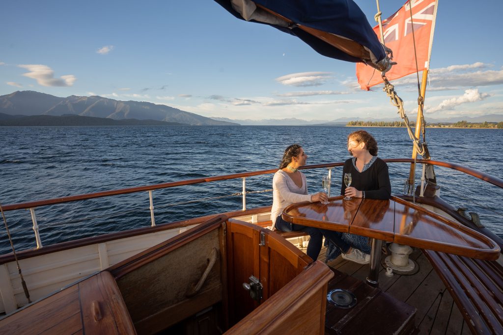 Evening Champagne Cruise - Step Into Timeless Elegance: Evening Cruises on Te Anau’s Historic 1935 Motor Yacht
